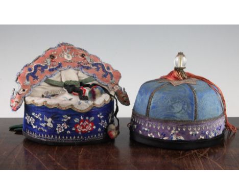 Two Chinese embroidered silk hats, late 19th / early 20th century, the first an official's hat with a rock crystal and brass 