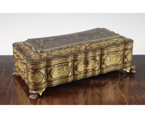 A Chinese export gilt decorated lacquer games box, 19th century, of shaped outline, the cover decorated with playing cards an