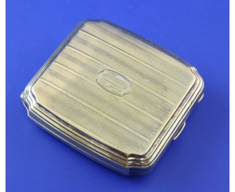 A 1920's/1930's Tiffany & Co sterling silver gilt cigarette case, of square form with inverted corners, engine turned decorat