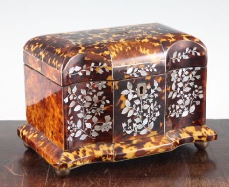 A Regency tortoiseshell and mother of pearl inlaid two division tea caddy, with serpentine front, on ball feet, 7.75in.