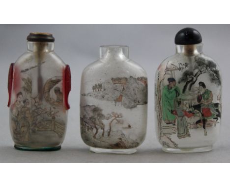 Three Chinese inside-painted glass snuff bottles, 20th century, all inscribed, the first with boats in river landscapes, 6.2c
