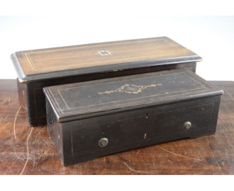 A late 19th century Swiss rectangular rosewood cased music box, the barrel movement playing eight airs, overall 21in., togeth
