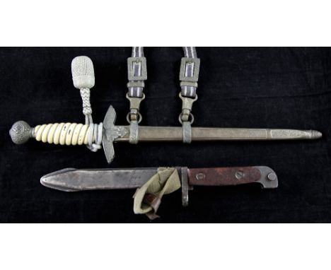 A Third Reich Second Pattern Luftwaffe officer's dagger by Robert Klaas, Solingen, with wirebound white plastic grip, silver 