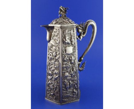 A late 19th/early 20th century Chinese silver coffee pot by Wang Hing, Hong Kong, of tapering hexagonal form, with panels emb