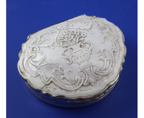 A 19th century silver and shell mounted snuff box, of shaped cartouche form, with engine turned base, foliate scroll decorati