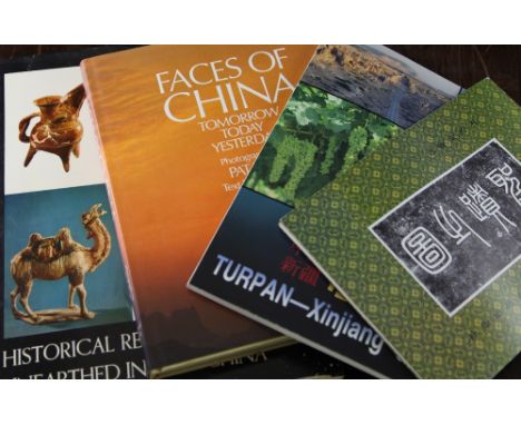 A collection of approximately sixteen Chinese reference books, including "The Thistle and the Jade," (ed. Keswick, M.) and "C