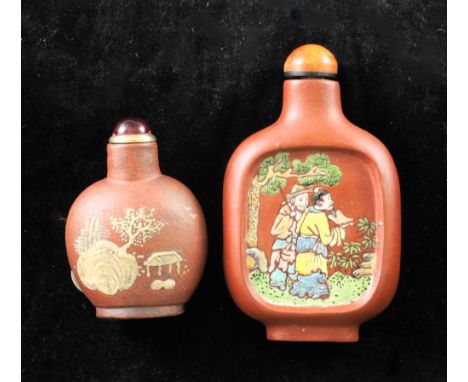 Two Chinese Yixing pottery snuff bottles, 1800-1900, the first slip decorated to each side with with a building in a rockwork