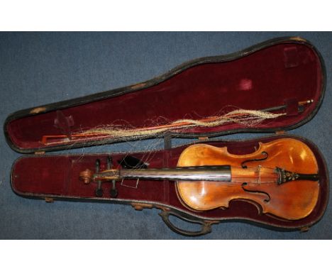 A 19th century Continental violin, the back marked Vuillaume à Paris, together with a similarly marked internal label, 14.25i