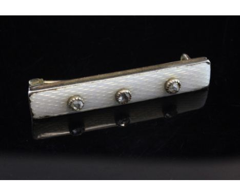A late 19th/early 20th century 56 zolotnik gold, pale blue guilloche enamel and rose cut diamond bar brooch by Carl Faberge, 