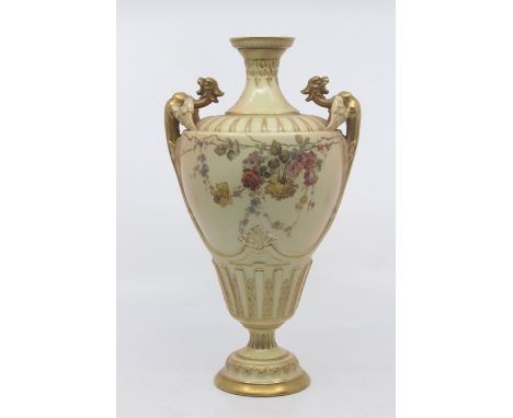 A Royal Worcester blush ivory vase, dated 1894, of ovoid shape with twin griffin handles, with moulded rim and shoulder, the 