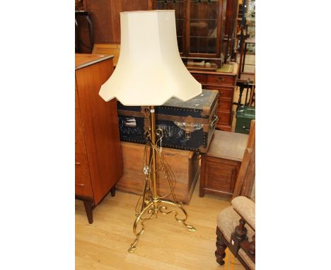 A brass telescope, mid 20th Century standard lamp