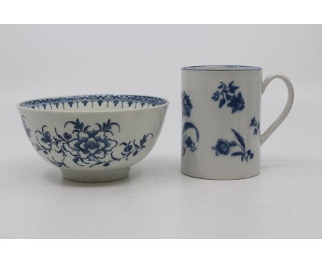 A Worcester mug, circa 1770-85, of cylindrical form with ribbed strap handle, printed in blue with the 'Gilliflower' pattern,