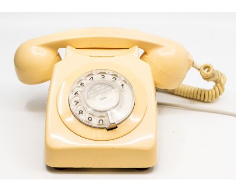 A 1970's ivory coloured telephone