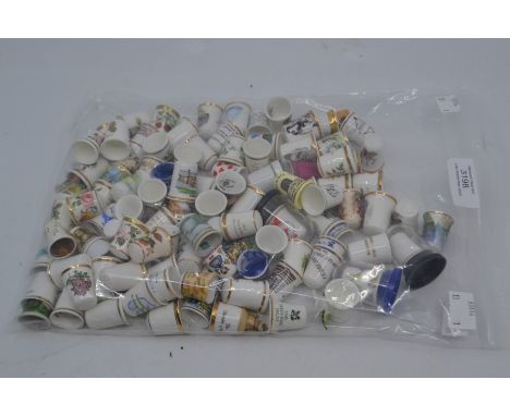 Thimbles: a large collection of assorted ceramic thimbles, of various subjects, including floral, foliage and various commemo