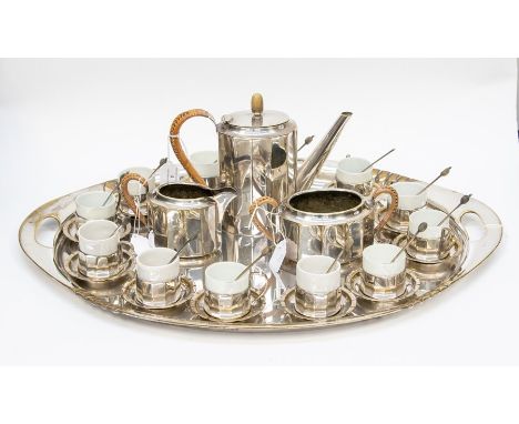 An Art Deco silver plated coffee service, comprising coffee pot, cream jug, two handled sugar bowl, twelve cup and saucers an