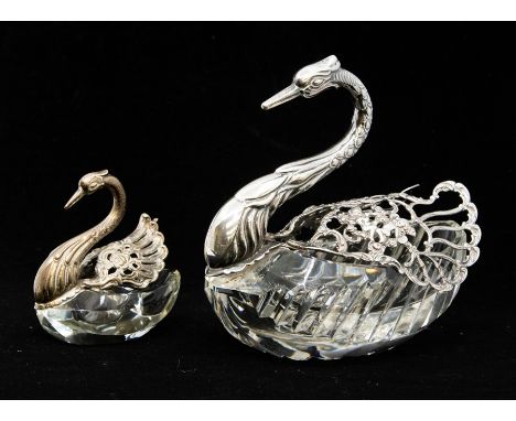 A sterling silver bonbon swan figural dish, with folding wings, cut glass body, together with a white metal miniature bonbon 