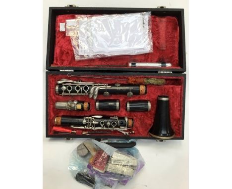 A Selmer Series 9 Clarinet, French made, each piece made from ebony, white metal bands, fitted in original carry case, comple