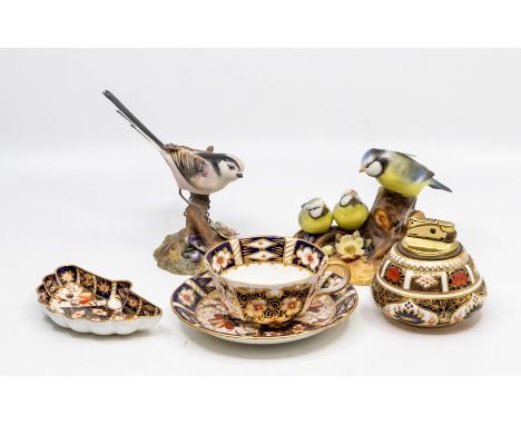 Two Royal Crown Derby china bird figures, long tail tit, blue tit and chicks, 1218 table lighter, 2451 cup and saucer and 245