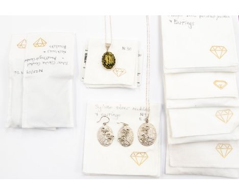 A pair of sterling silver and citrine earrings, with matching pendant and bracelet; a silver and amethyst necklace and bracel