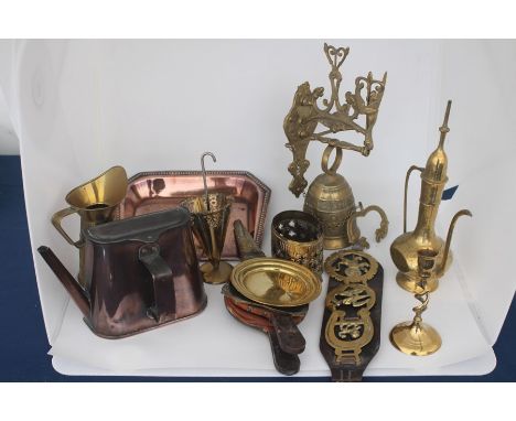 Two boxes of assorted brass ware, including a pair of Victorian candlesticks, horse brasses, fireside brasses, model canon, I