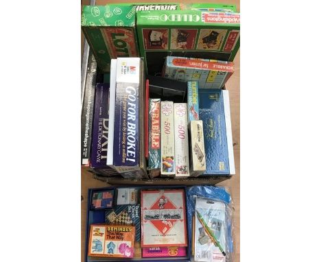 A collection of assorted 20th Century and later games, including Topple Blocks, Solitaire board, Monopoly, Dominoes, Backgamm