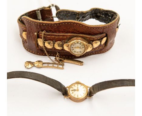 A ladies 9ct gold Rotary watch, round champagne dial, approx 13mm, replacement winder, on leather strap, along with another v