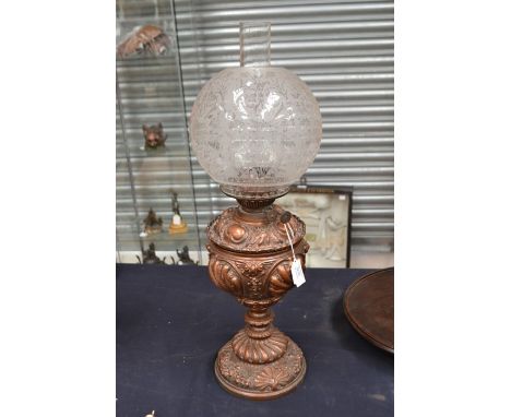 Victorian spelter metal oil lamp with etched glass shade, cracking to reservoir.