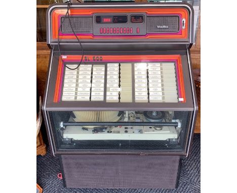 Wurlitzer: A Wurlitzer SL600 Jukebox, non-working order: lights up but record do not play, mid-1980's, replacement glass to l