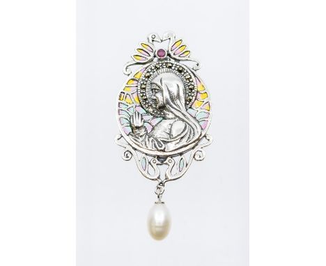 A silver plique a-jour enamel brooch/pendant in the form of the Virgin Mary, the surround set with a ruby and yellow, green a