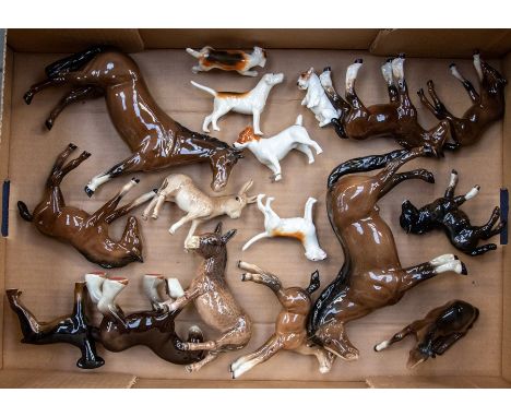 A collection of Beswick horses, donkeys and hunting dogsCR donkey is AF