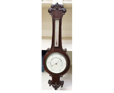 A mid 19th Century mahogany banjo barometer and thermometer, scrolled top and bottom