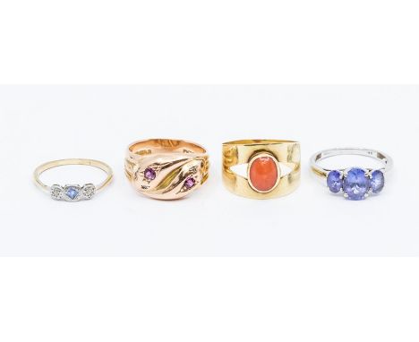 A George V 9ct gold, ruby and diamond snake ring, size R, Birmingham 1919, approx 6.7gms (one pink stone replaced with paste)