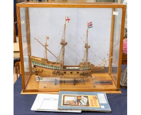 Cased scale model of the Golden Hind, with original construction notes