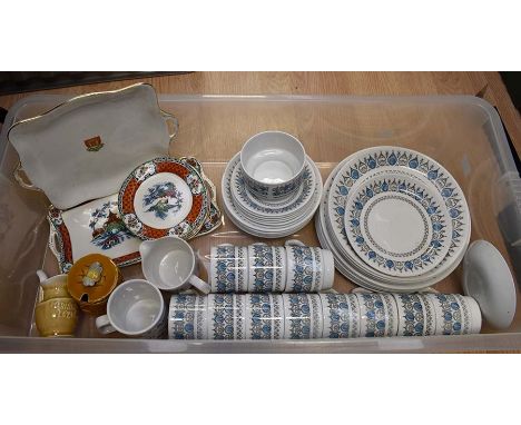 A 1970's studio pottery part coffee set in blue pattern on a white background comprising cups, saucers, side plates, dinner p