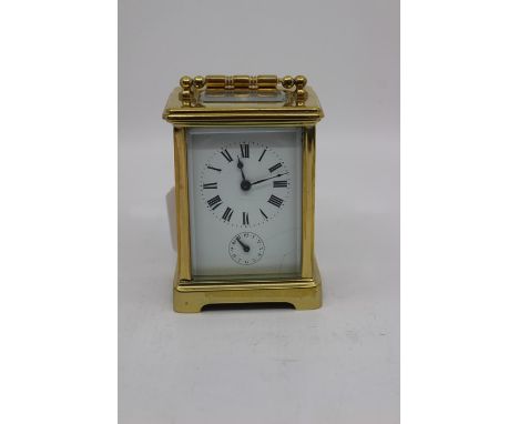 A Victorian brass carriage clock