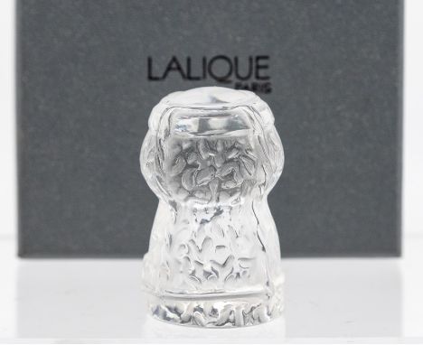 A Lalique glass model of a champagne cork, signed with box