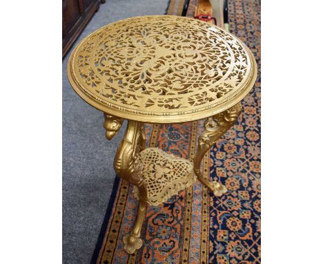 A Reproduction Gilded Cast Metal Two-Tier Table, with bird form legs, 52cm by 68cm, and A Painted Mirrored Brass Fire Screen 