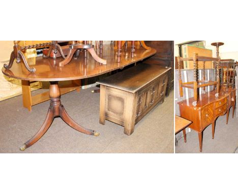 A Regency Style Mahogany Twin Pedestal Dining Table, a similar serpentine sideboard, a carved oak blanket box, and three barl