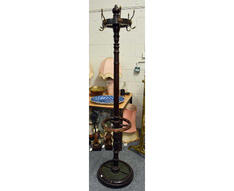 A Late Victorian Mahogany Coat Stand, the brass hooks with lion masks, 186cm highBase is broken and repaired, leaving the sta