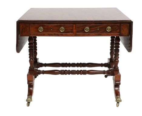 A George IV Mahogany Dropleaf Sofa Table, 2nd quarter 19th century, with two sham and two real mahogany-lined drawers, the do