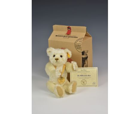 A Steiff Year Bear - The Millennium Bearhaving button in ear with yellow tag, serial number 35778, complete with original bag