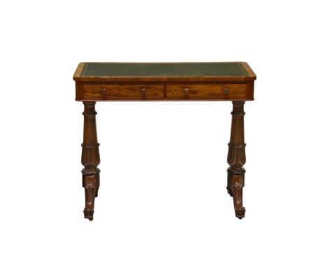 A William IV mahogany writing table the rectangular top with inset green leather over two frieze drawers with wooden handles 