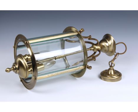 A 19th century style lacquered brass four glass hall lantern with bevelled glass panels and three light fitting, 21in. (53.25
