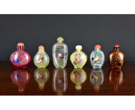 A collection of six Chinese interior painted glass snuff bottles20th century, of varying forms to include a pink glass versio