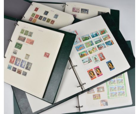 Philately interest - Five Worldwide stamp binders to include Singapore, Aland, Greenland, Iceland, Faroe Islands, Norway, Cay