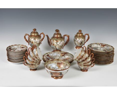 A Japanese Satsuma porcelain part tea service early 20th century, comprising a teapot, cream jug, twin handled sucrier, slop 