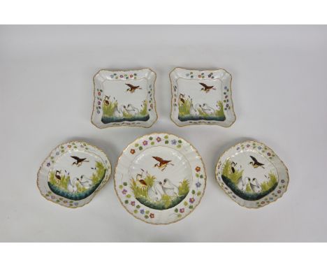 A part Naples porcelain dessert service gilded, crowned N mark, comprising eight 9in. plates, two shaped square dishes and tw