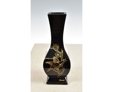 A Baccarat black glass baluster shaped square section vaseJaponesque style, decorated in gold depicting birds on branches, ba