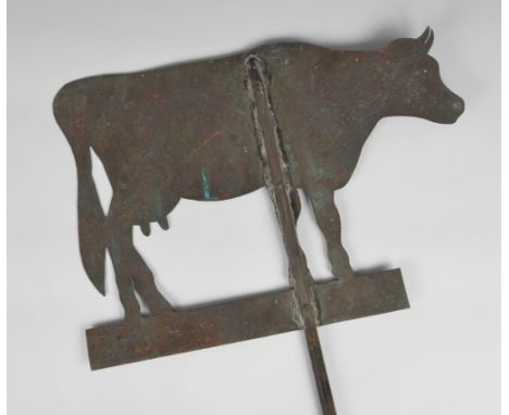 An antique copper cow weather vane from a Guernsey farm house, green verdigris patina, 20in. (50.8cm.) wide. 