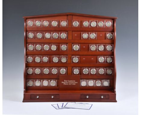 Danbury Mint 'The Complete Shilling Collection from 1937-1966' 53 coins from 58, (some 92.5% + some 50% ag.) in open wall she